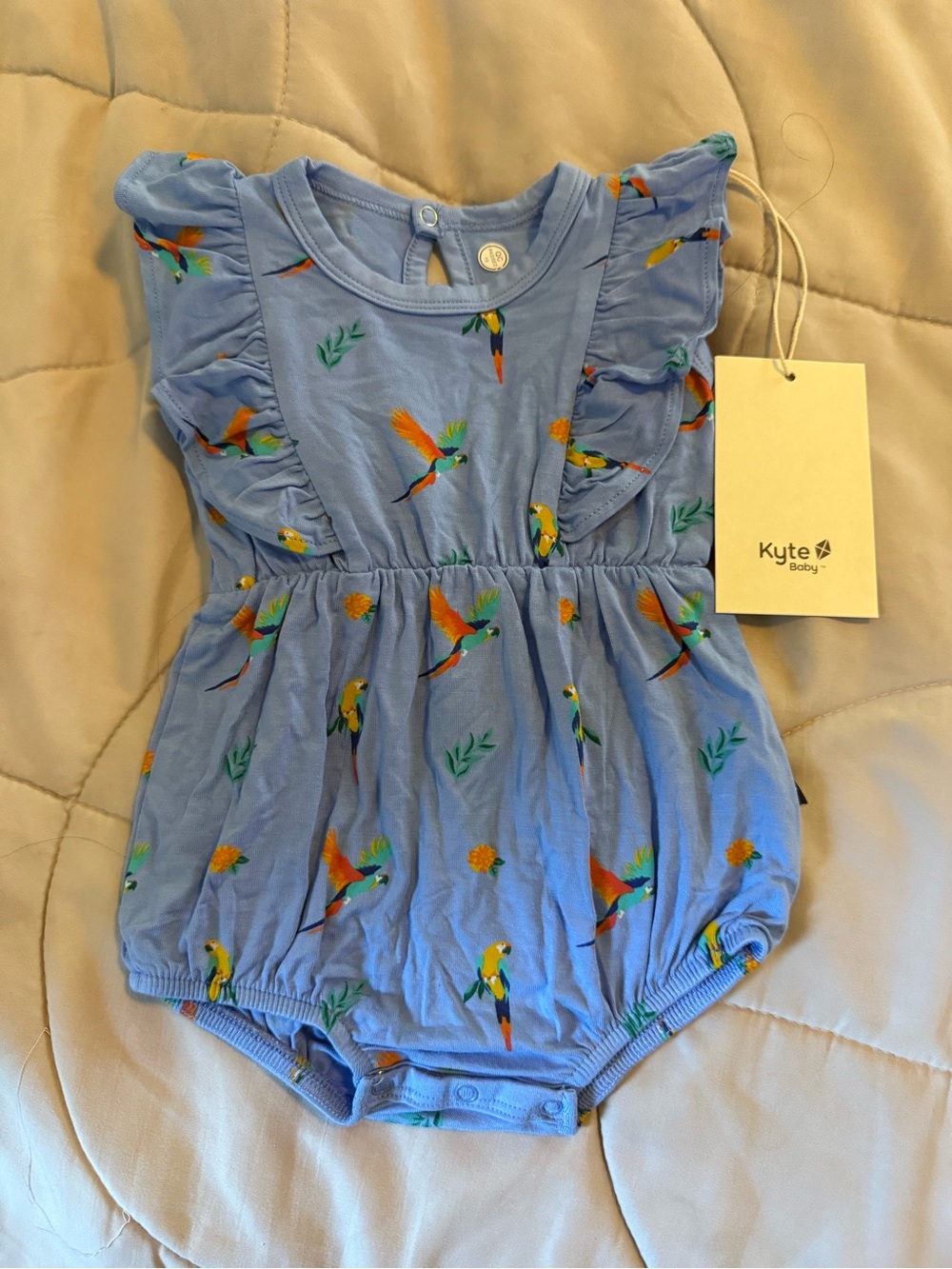 Kyte BABY Light Blue Parrot Ruffle Romper